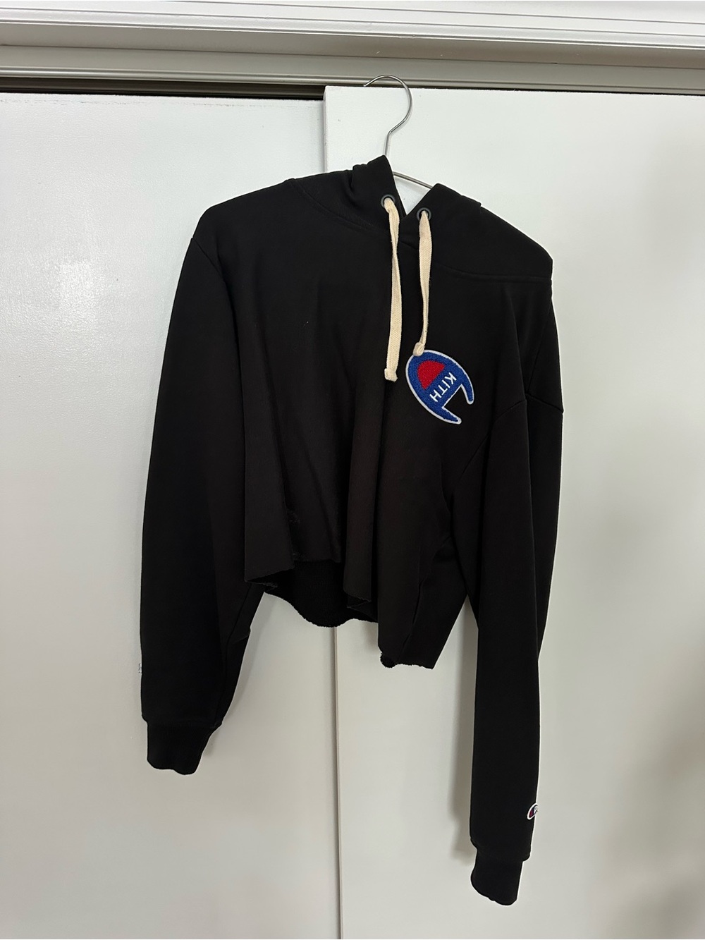 Kith Black Cropped Hoodie with Blue & Red Patch
